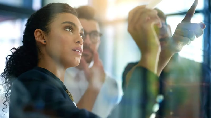 A group of lawyers reviewing real-time data