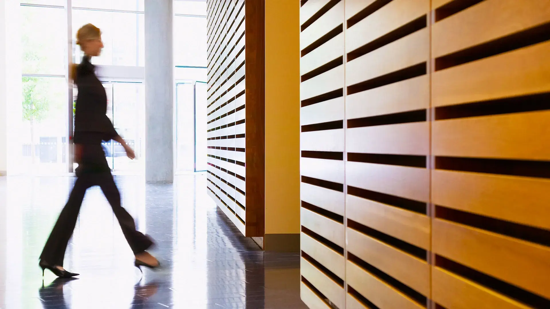 Silhouetted professionals walking and cloud as a business strategy 