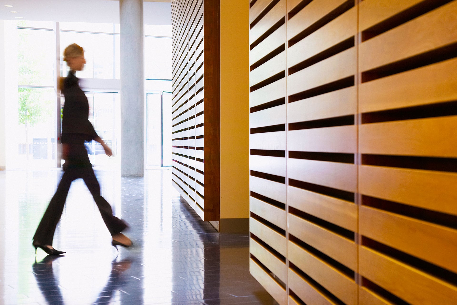 Silhouetted professionals walking and cloud as a business strategy 